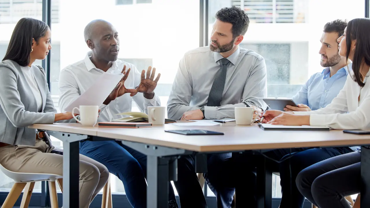 A group of employees engaged in a discussion
